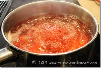 Boiling water with red food coloring