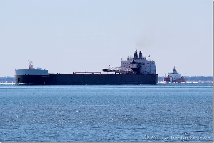 The American Spirit followed by the U.S. Coast Guard cutter on Lake Superior