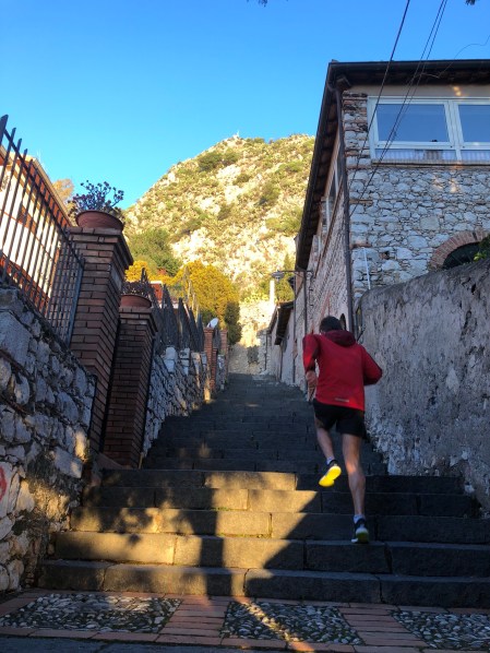 Climbing the stairs in Taormina